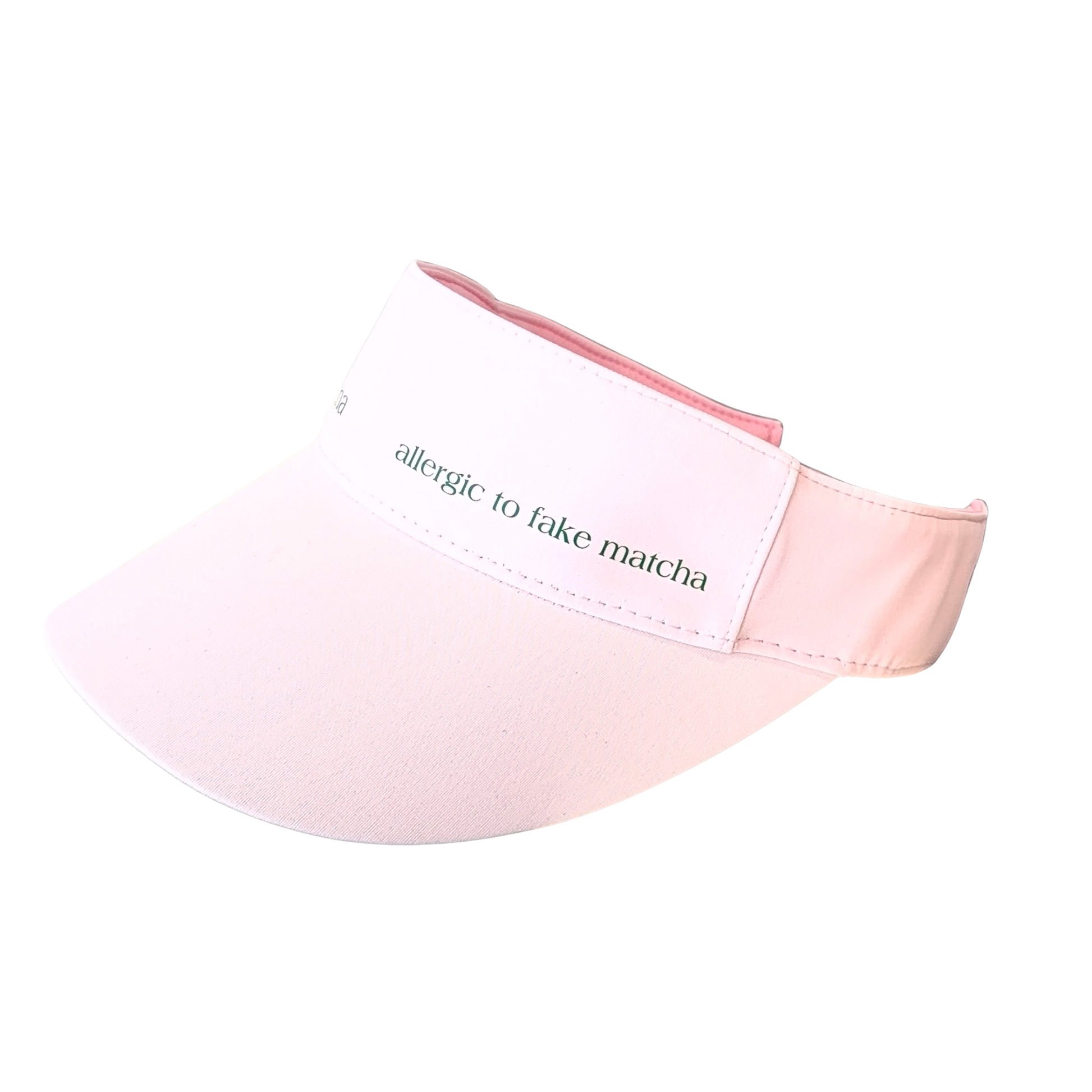 A light pink visor hat featuring the text 'allergic to fake matcha' in green script